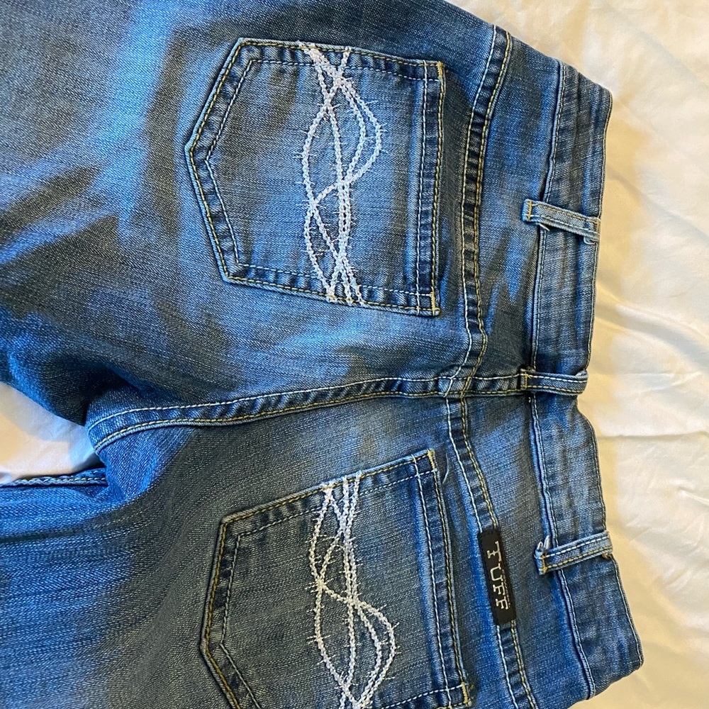 Cowgirl tuff company jeans.
